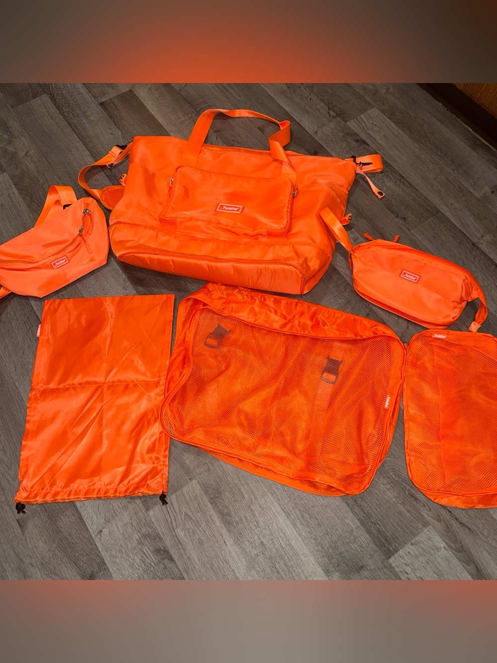 The Foldie 6 piece Orange Women's Travel Duffel with Packing Organizers